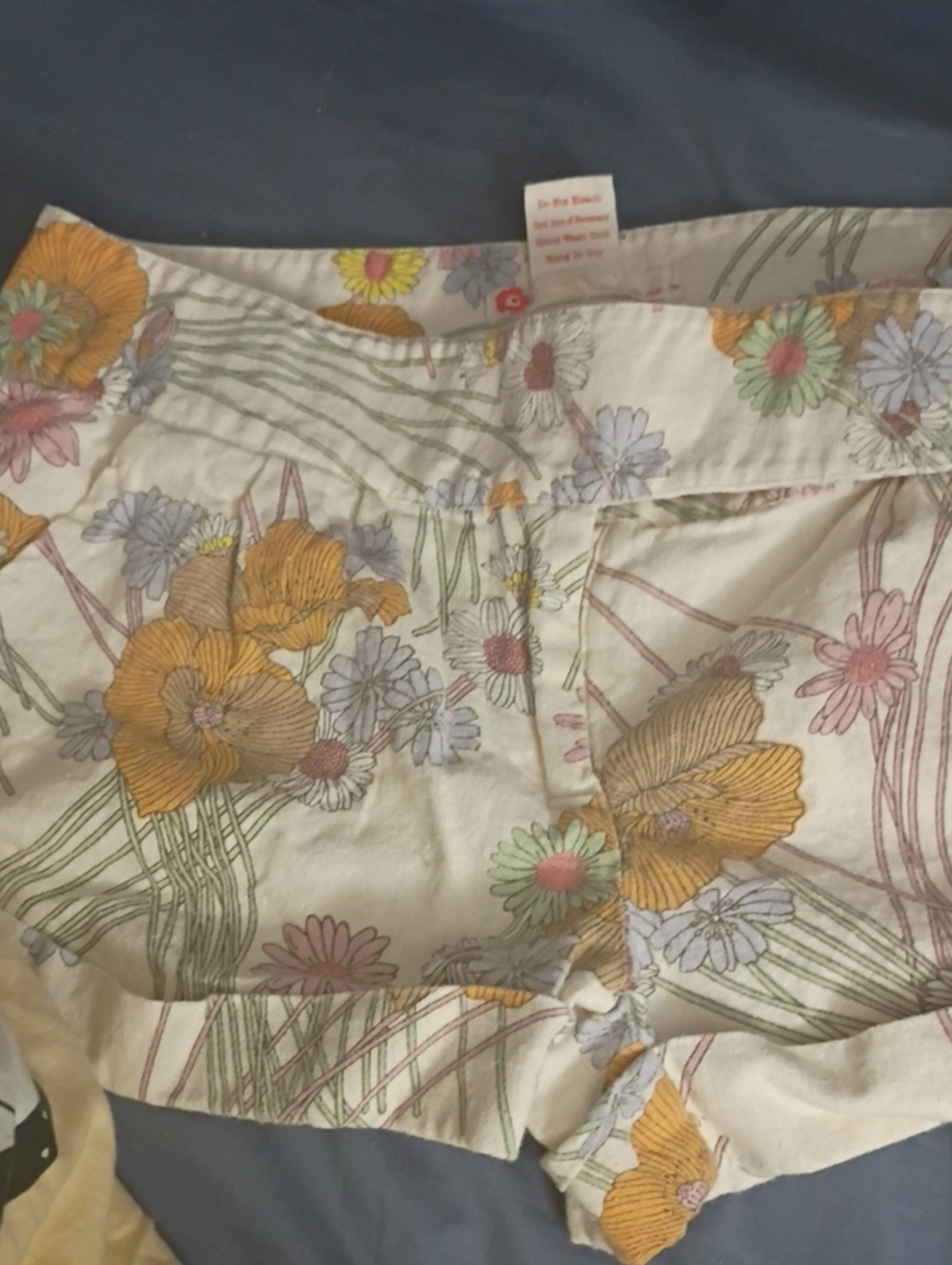 Forever 21 Cream Floral Shorts with Yellow & Pastel Blooms. Micro Low Rise Short